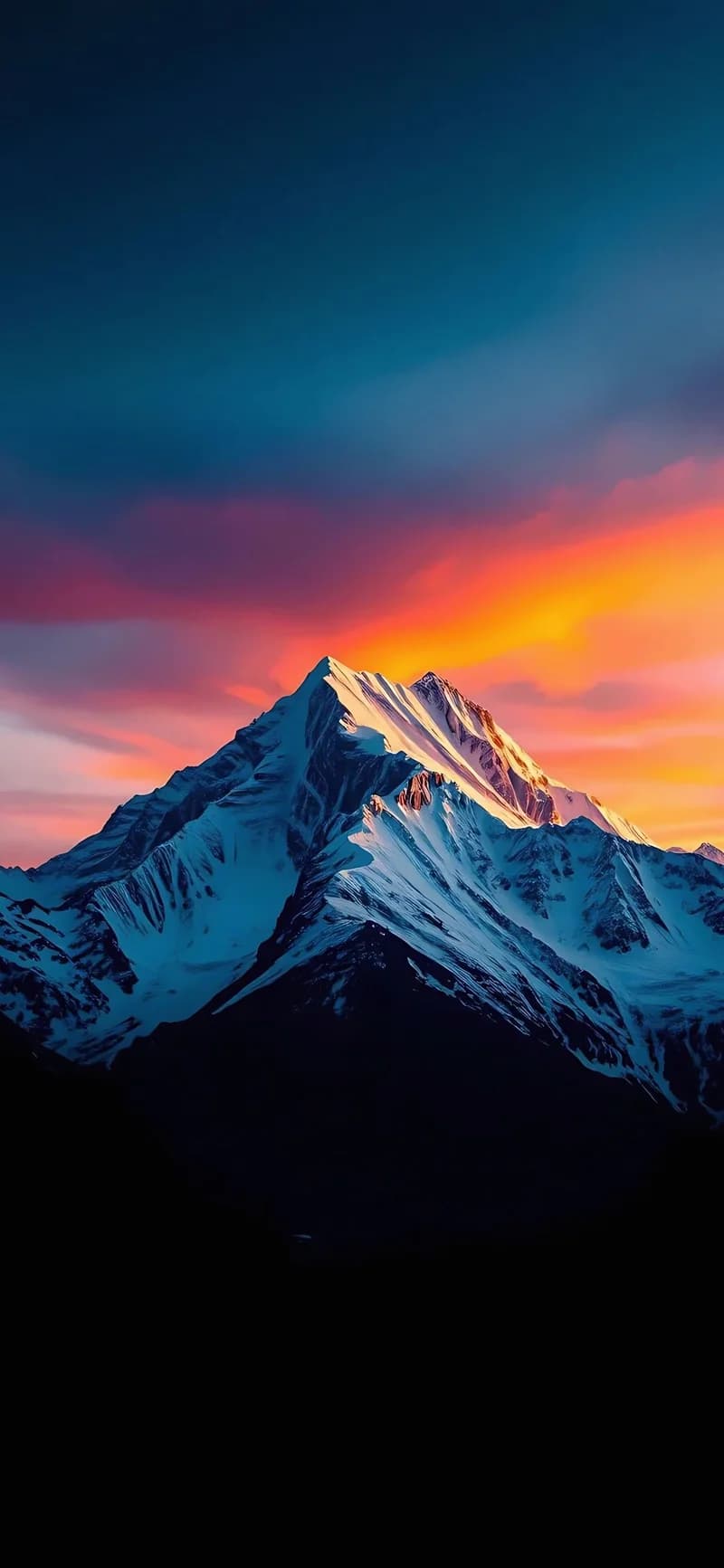 Snow-Capped Peak Under Radiant Sunset Skies 4K Nature Wallpaper